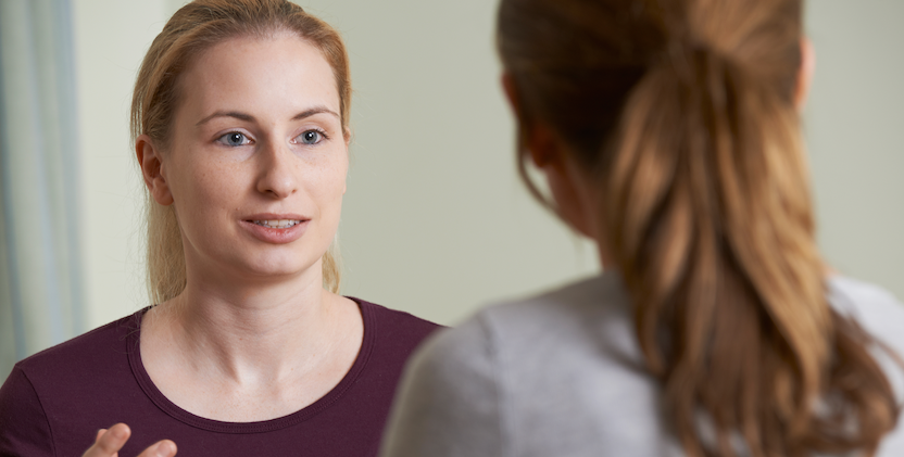 Two women talking 