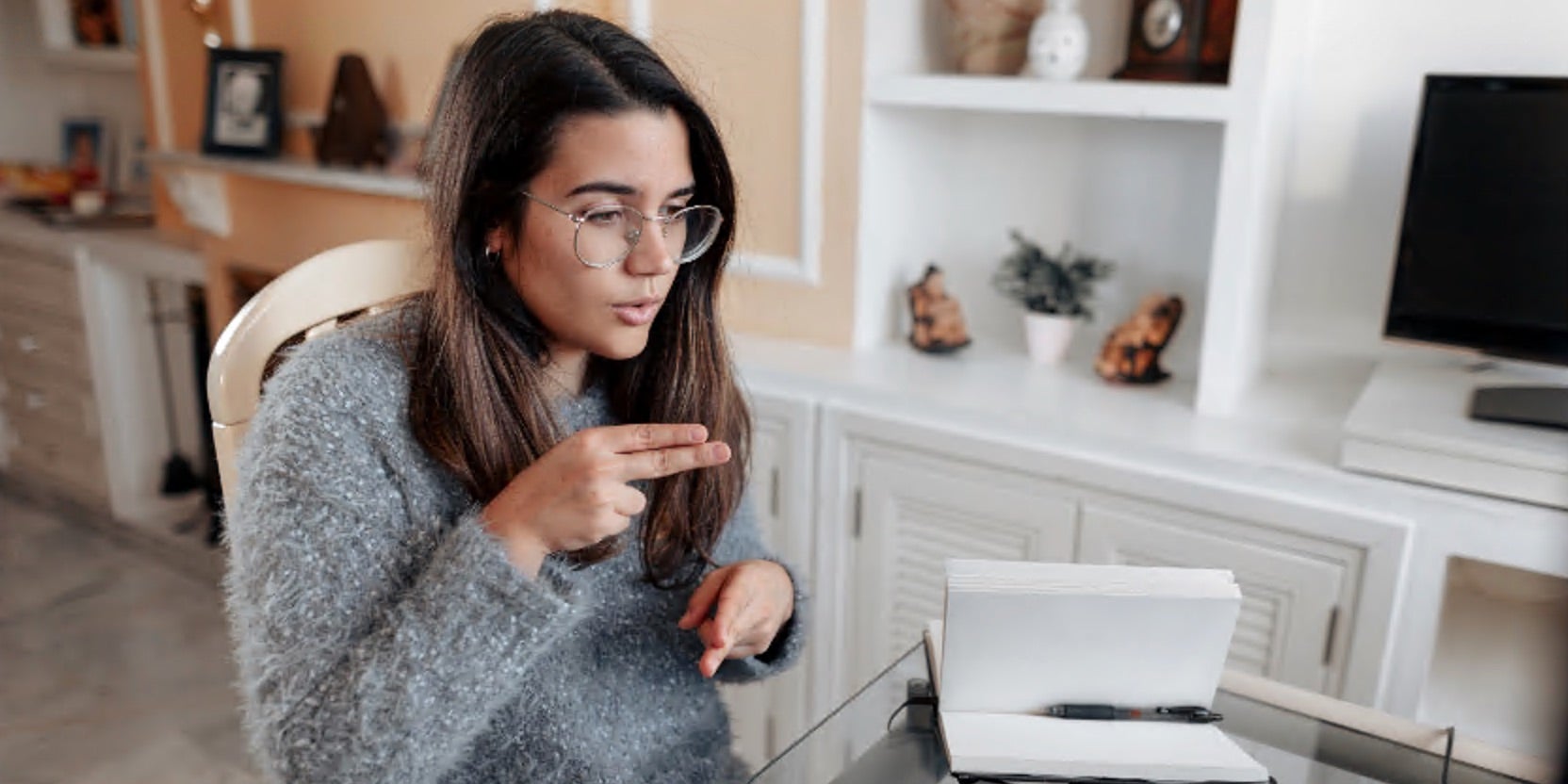 Image of women using sign language at a computer