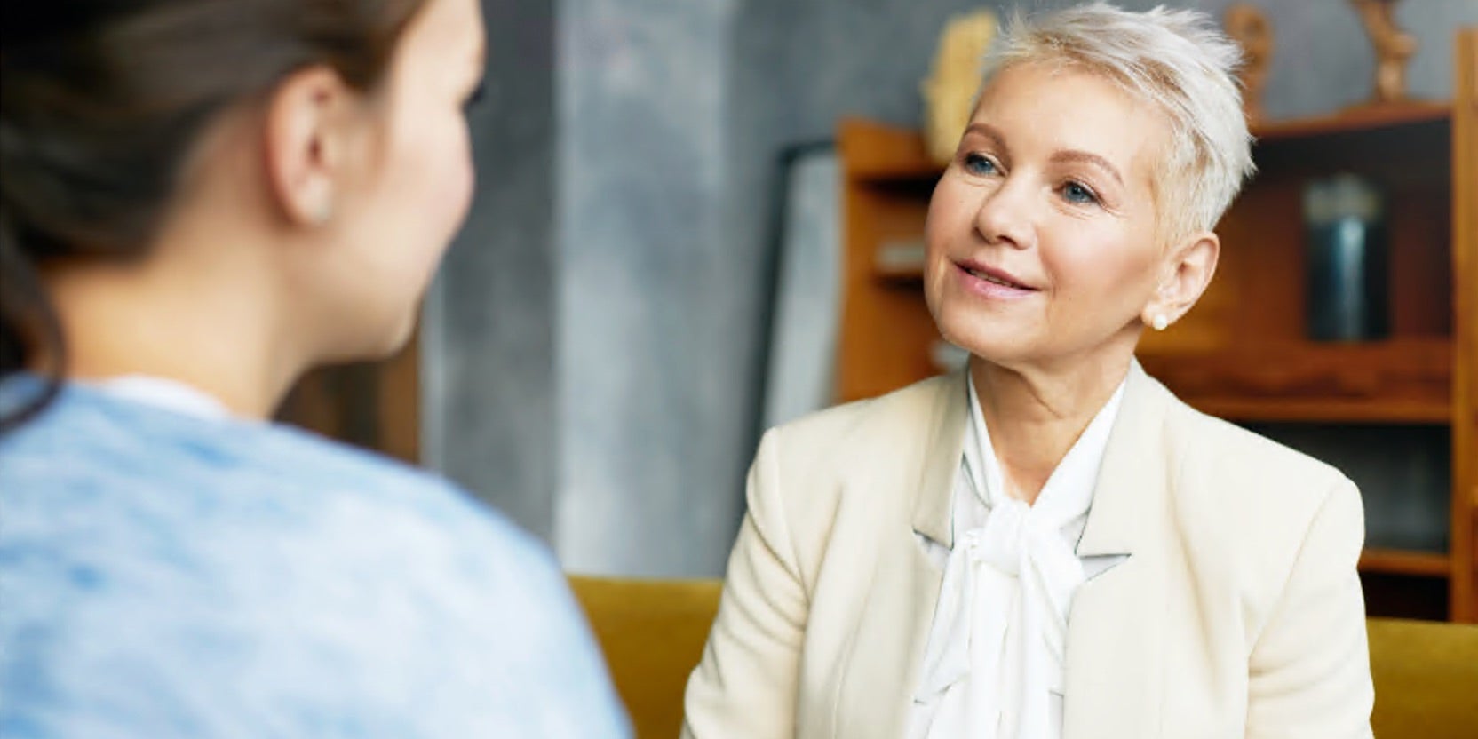 Image of two women in discussion