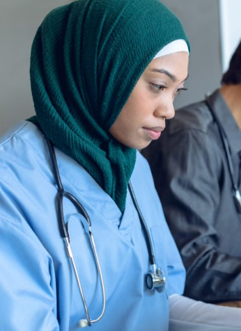 Image of young doctor on keyboard