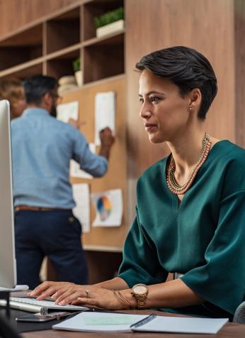 A woman working at a computer